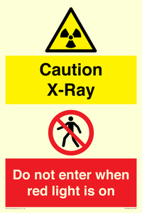 Caution X-Ray. Do not enter when red light is on